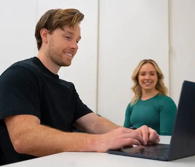 A local Plympton client recieving advice for a sporting injury from our physiotherapist during their physiotherapy consult