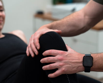 One of our physiotherapists conducting manual physiotherapy treatments for a local West Beach patient